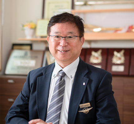 代表者取締役社長 梶原<br>久夫